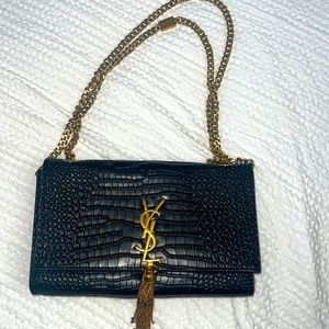 Ysl none authentic clutch with copper chain and logo